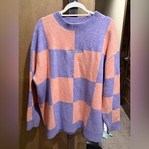 Notice the Reckless Women's Bold Colorblock Sweater - Lavender and Coral